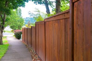 Wooden Fence Along Suburban Residential Neighborhood Concrete Si